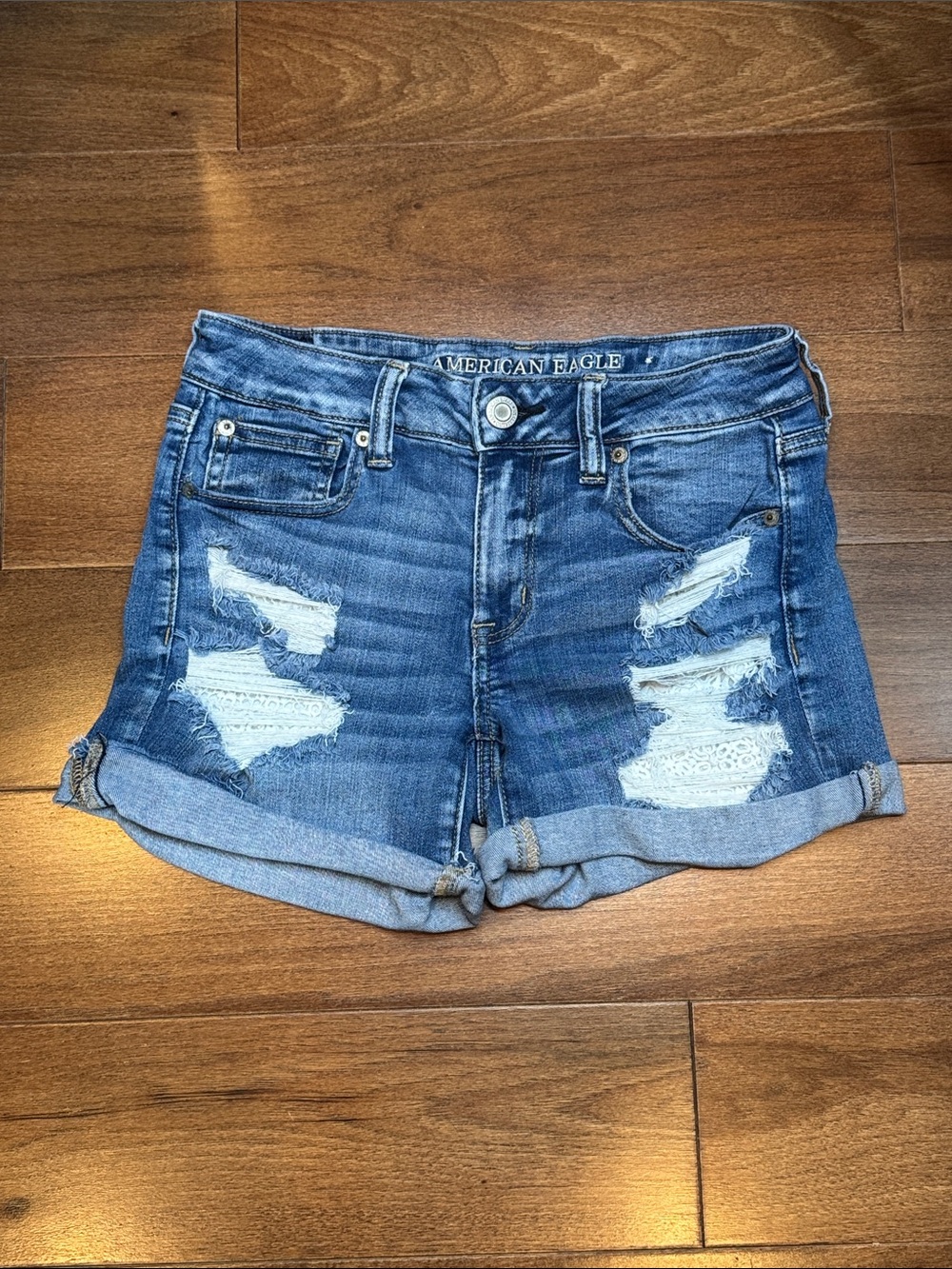 AMERICAN EAGLE MIDI Distressed Denim Shorts